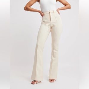 Because of Alice wide leg suit trousers. Light pink.